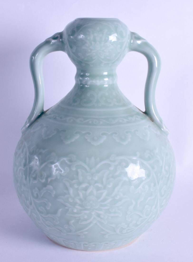 A CHINESE TWIN HANDLED CELADON VASE bearing Yongzheng (1 of 3)