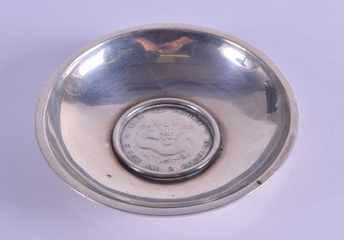 AN EARLY 20TH CENTURY CHINESE SILVER MOUNTED COIN (1 of 2)