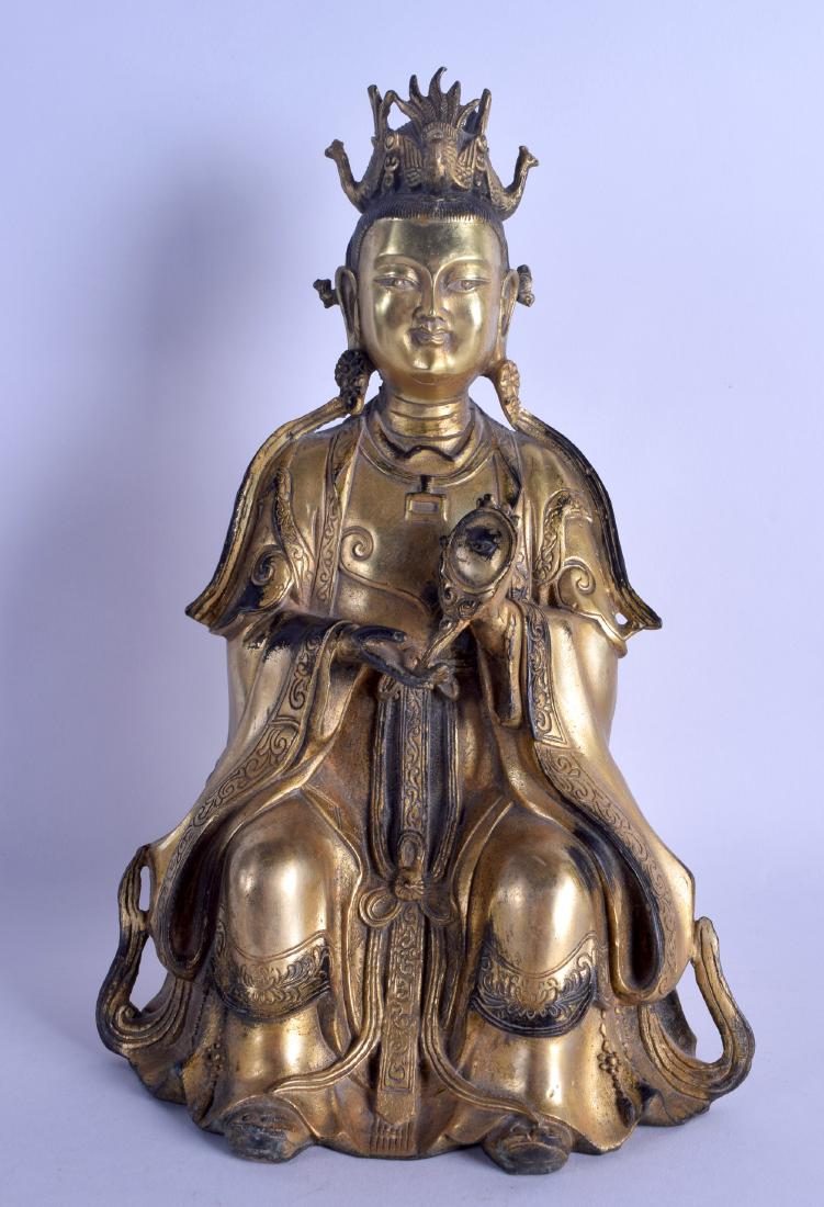 A CHINESE GILT BRONZE FIGURE OF A SEATED GUANYIN (1 of 4)