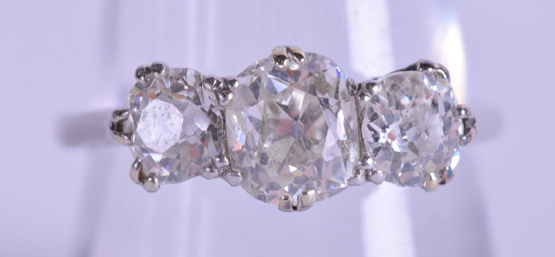 A GOOD LARGE ANTIQUE PLATINUM AND DIAMOND THREE STONE (1 of 4)