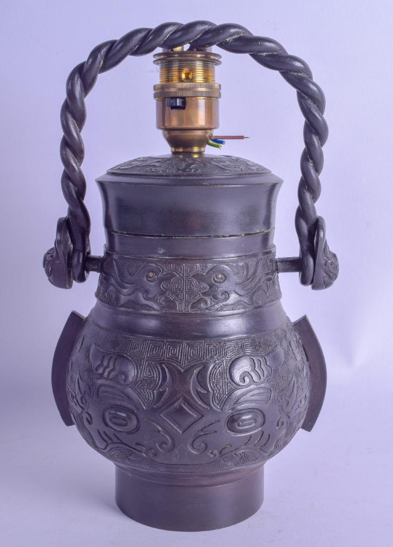 AN 18TH/19TH CENTURY CHINESE BRONZE SWING HANDLED VASE (1 of 5)