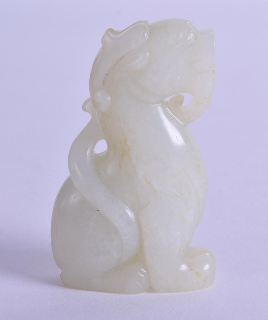 A 19TH CENTURY CHINESE CARVED GREENISH WHITE JADE (1 of 3)