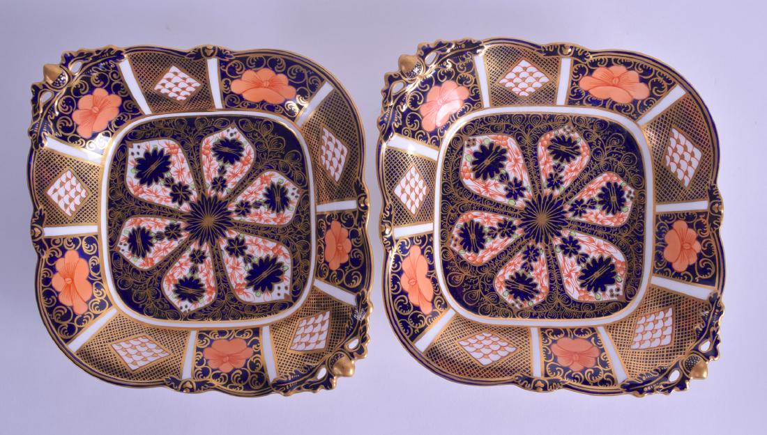 A PAIR OF ROYAL CROWN DERBY IMARI DISHES painted with (1 of 2)
