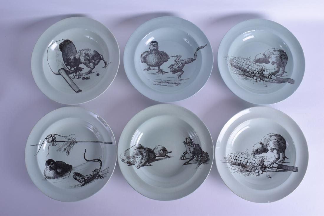 AN UNUSUAL SET OF SIX MINTON GREY GLAZED CELADON TYPE: AN UNUSUAL SET OF SIX MINTON GREY GLAZED CELADON TYPE BOWLS decorated with various scenes of animals. 24 cm diameter. (6)