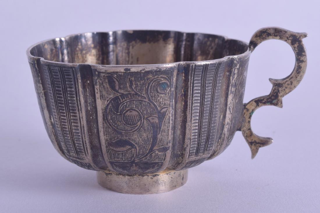 A 19TH CENTURY RUSSIAN NIELLO SILVER CUP with scrolling (1 of 3)