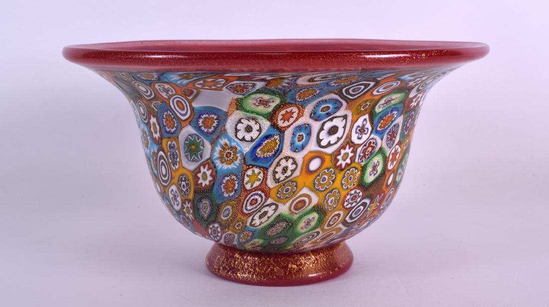 A STYLISH ITALIAN GAMBARO AND POGGI MURANO GLASS BOWL: A STYLISH ITALIAN GAMBARO AND POGGI MURANO GLASS BOWL decorated with millefiori flowers. 21 cm x 11.5 cm.
