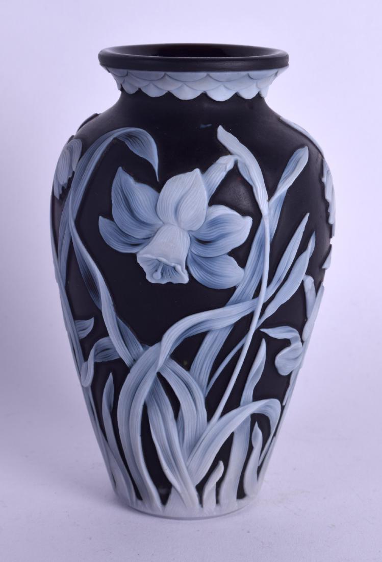A FINE ENGLISH BLACK CAMEO GLASS VASE Attributed to: A FINE ENGLISH BLACK CAMEO GLASS VASE Attributed to Thomas Webb, wonderfully decorated with extensive foliage. 13 cm high.