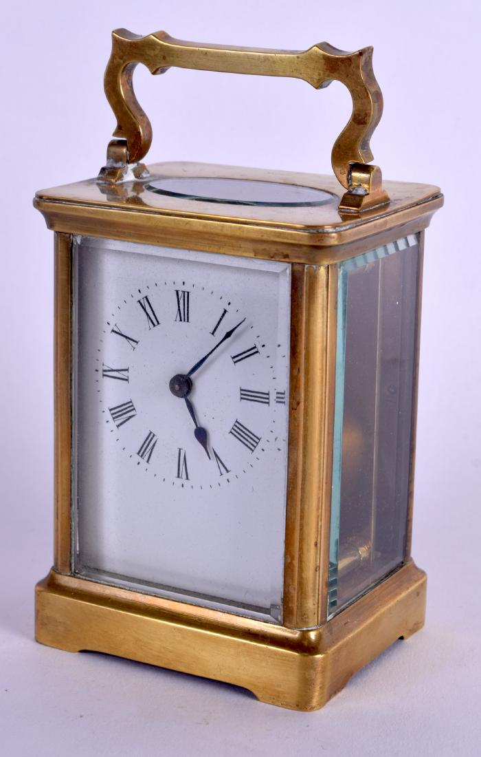 AN EARLY 20TH CENTURY FRENCH BRASS CARRIAGE CLOCK with (1 of 4)