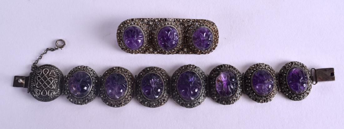 AN EARLY 20TH CENTURY CHINESE SILVER AND AMETHYST (1 of 3)