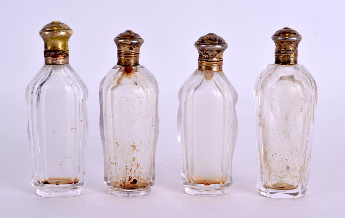 FOUR 19TH CENTURY FRENCH SILVER GILT SCENT BOTTLES. 9.5 (1 of 2)