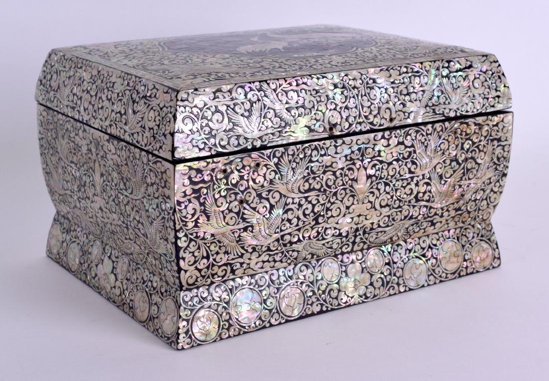 AN EARLY 20TH CENTURY JAPANESE MEIJI PERIOD MOTHER OF: AN EARLY 20TH CENTURY JAPANESE MEIJI PERIOD MOTHER OF PEARL BOX AND COVER decorated with cranes within landscapes. 18 cm x 13 cm.