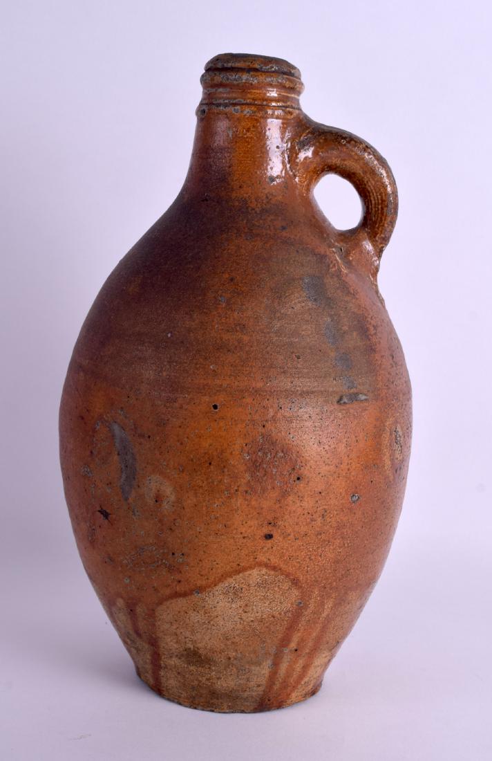 A LARGE 17TH/18TH CENTURY BELLARMINE STONEWARE JUG of (1 of 3)