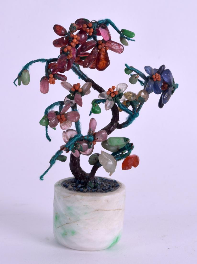 AN EARLY 20TH CENTURY CHINESE CARVED JADEITE ARCHERS (1 of 3)