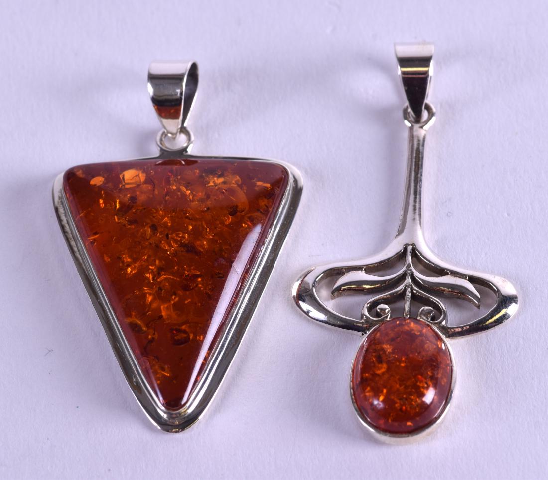 TWO SILVER AND AMBER PENDANTS. (2) (1 of 3)