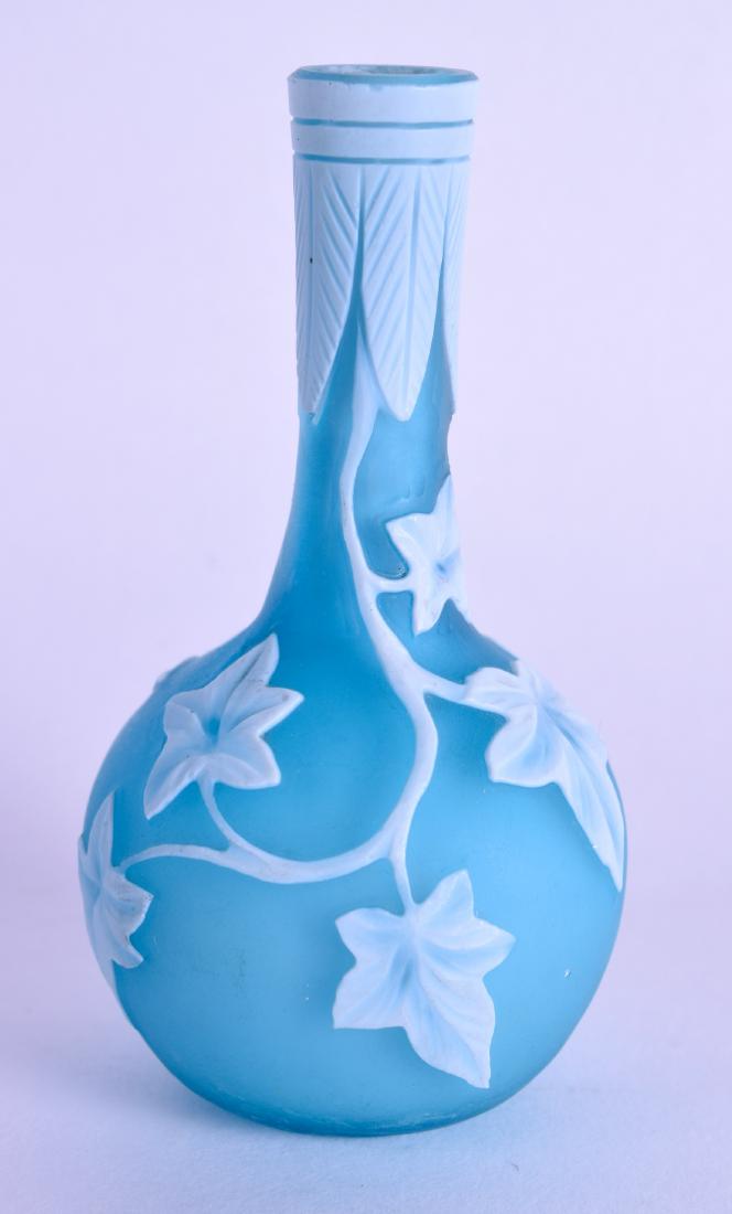 A LOVELY 19TH CENTURY CAMEO GLASS BOTTLE VASE: A LOVELY 19TH CENTURY CAMEO GLASS BOTTLE VASE Attributed to Thomas Webb, decorated with foliage. 8.25 cm high.