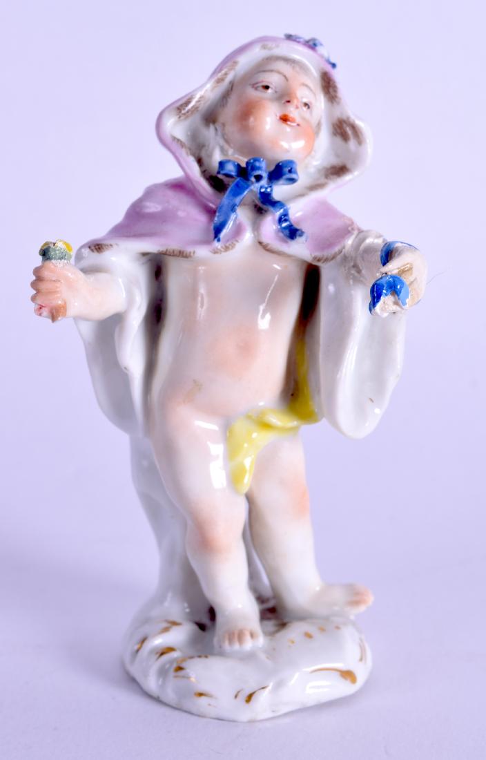 A 19TH CENTURY GERMAN PORCELAIN FIGURE OF A STANDING: A 19TH CENTURY GERMAN PORCELAIN FIGURE OF A STANDING CHILD Meissen style, modelled in a pink robe. 9 cm high.