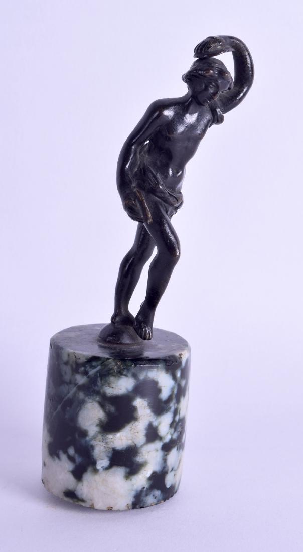 A 19TH CENTURY ITALIAN GRAND TOUR FIGURE OF A FEMALE: A 19TH CENTURY ITALIAN GRAND TOUR FIGURE OF A FEMALE modelled dancing upon a marble base. Bronze 11.5 cm high.