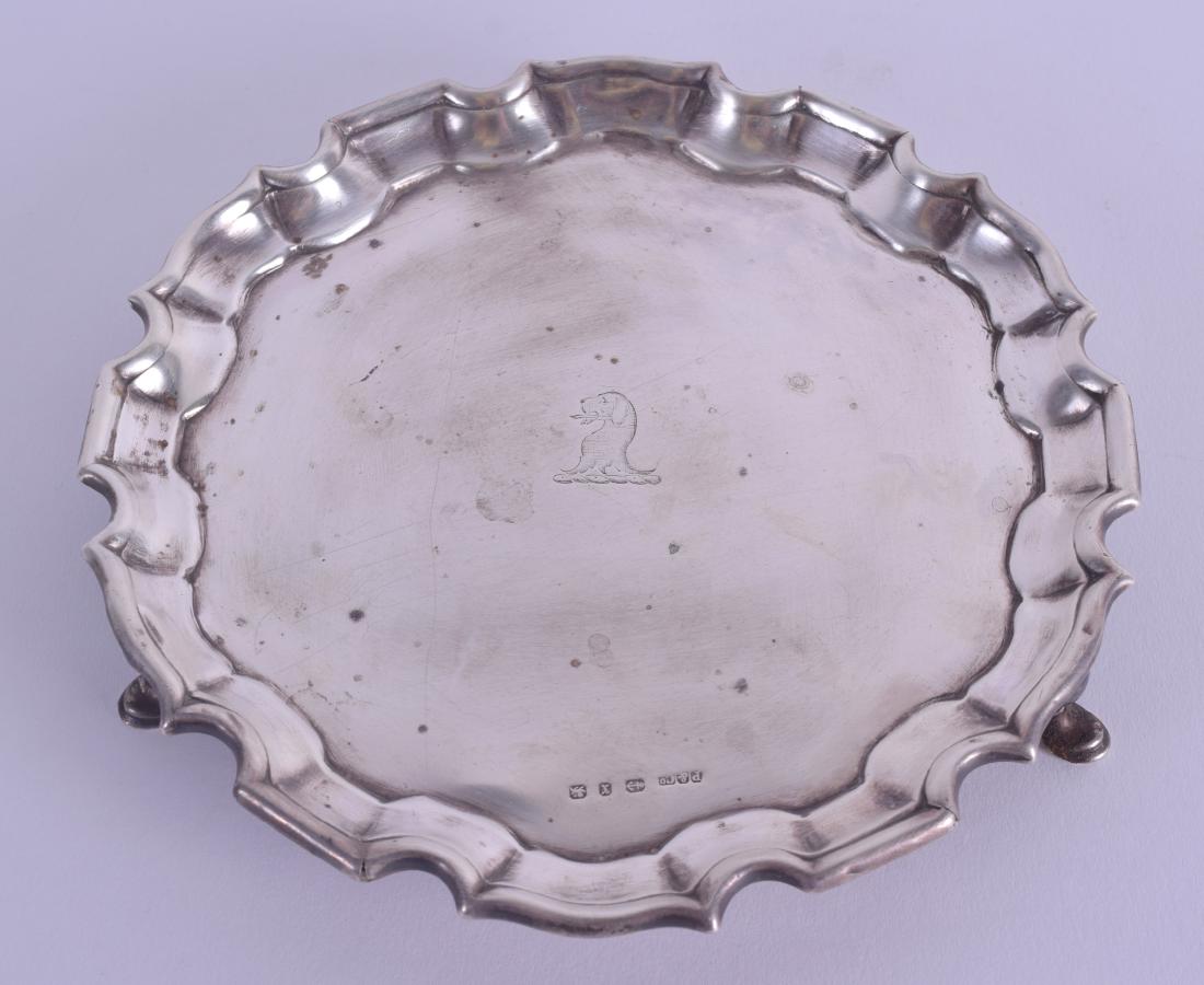 A LATE VICTORIAN CRESTED SILVER SALVER. Birmingham (1 of 4)