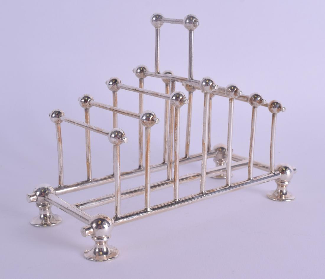 AN ARTS AND CRAFTS SILVER PLATE SIX DIVISION TOAST RACK (1 of 4)