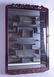 A CHINESE CARVED HARDWOOD SNUFF BOTTLE DISPLAY CABINET.