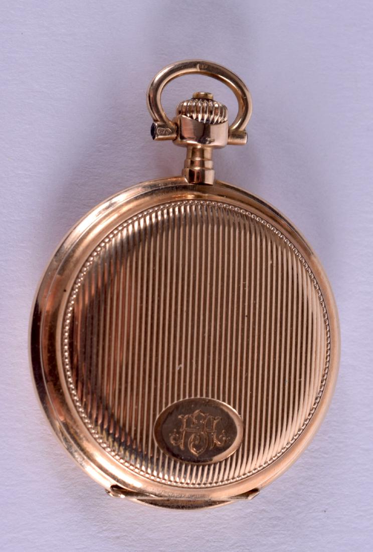 A SMALL 14CT GOLD LONGINES HUNTER FOB WATCH. 26.9: A SMALL 14CT GOLD LONGINES HUNTER FOB WATCH. 26.9 grams. 2.75 cm diameter.