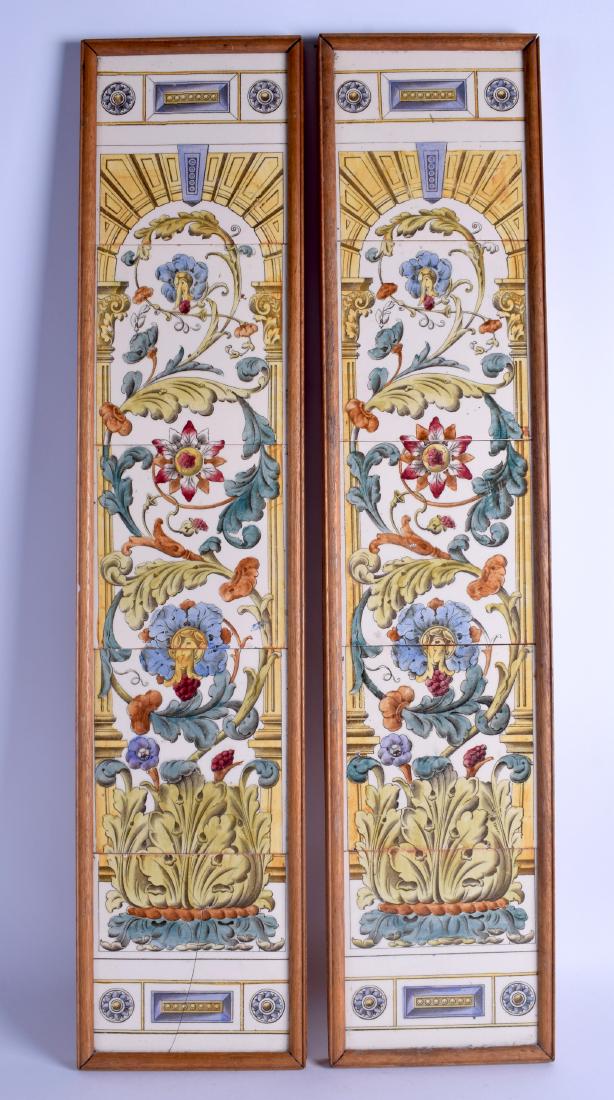 A PAIR OF 19TH CENTURY RECTANGULAR TILE DISPLAY: A PAIR OF 19TH CENTURY RECTANGULAR TILE DISPLAY HANGINGS formed with foliage and vines, each panel containing 4 tiles. 78 cm x 16 cm.