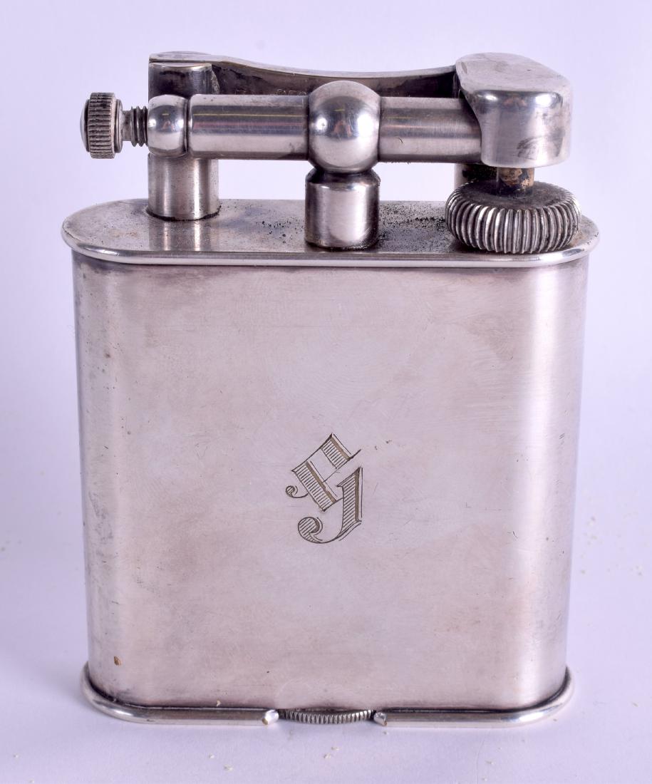 A LARGE VINTAGE DUNHILL SILVER PLATED TABLE LIGHTER. 11
