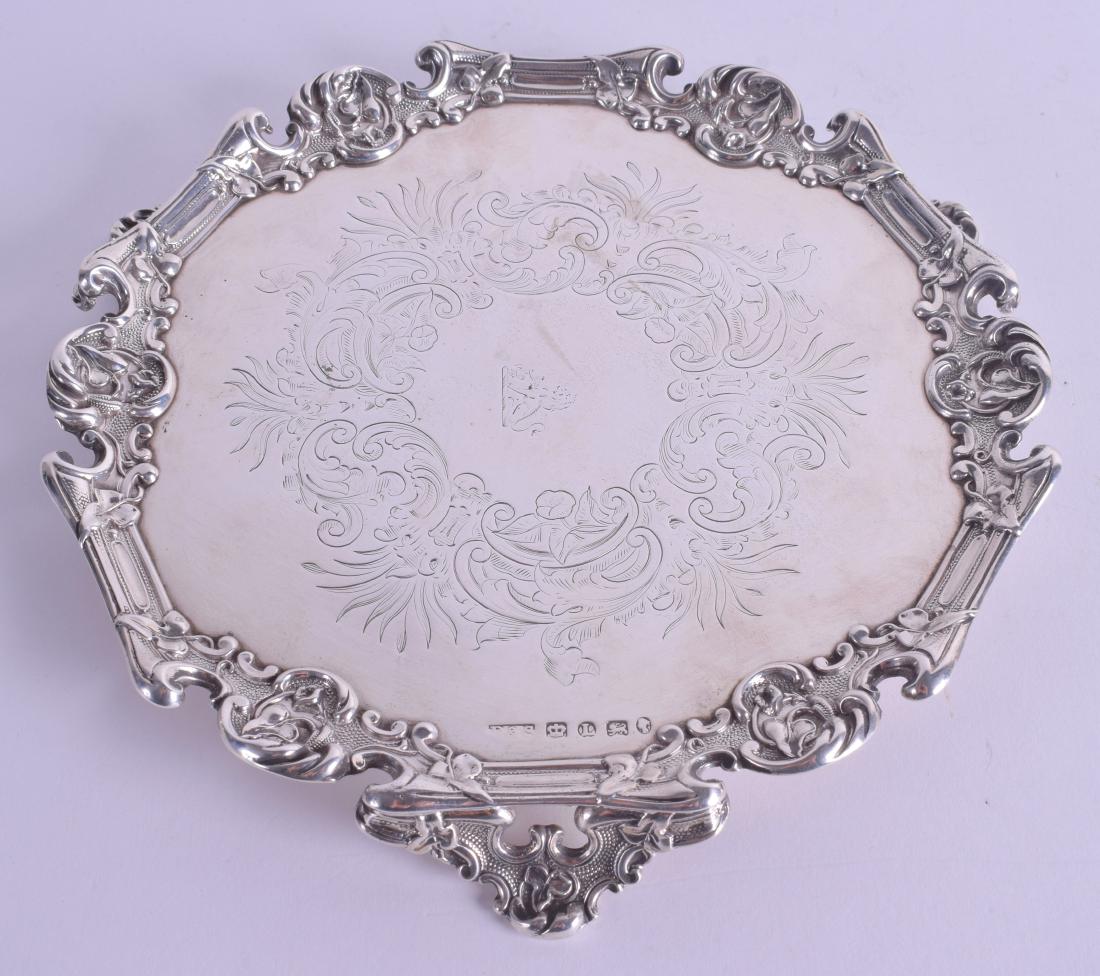 A VICTORIAN SILVER SALVER by Roberts & Slater.: A VICTORIAN SILVER SALVER by Roberts & Slater. Sheffield 1854. 11 oz. 11 cm wide.