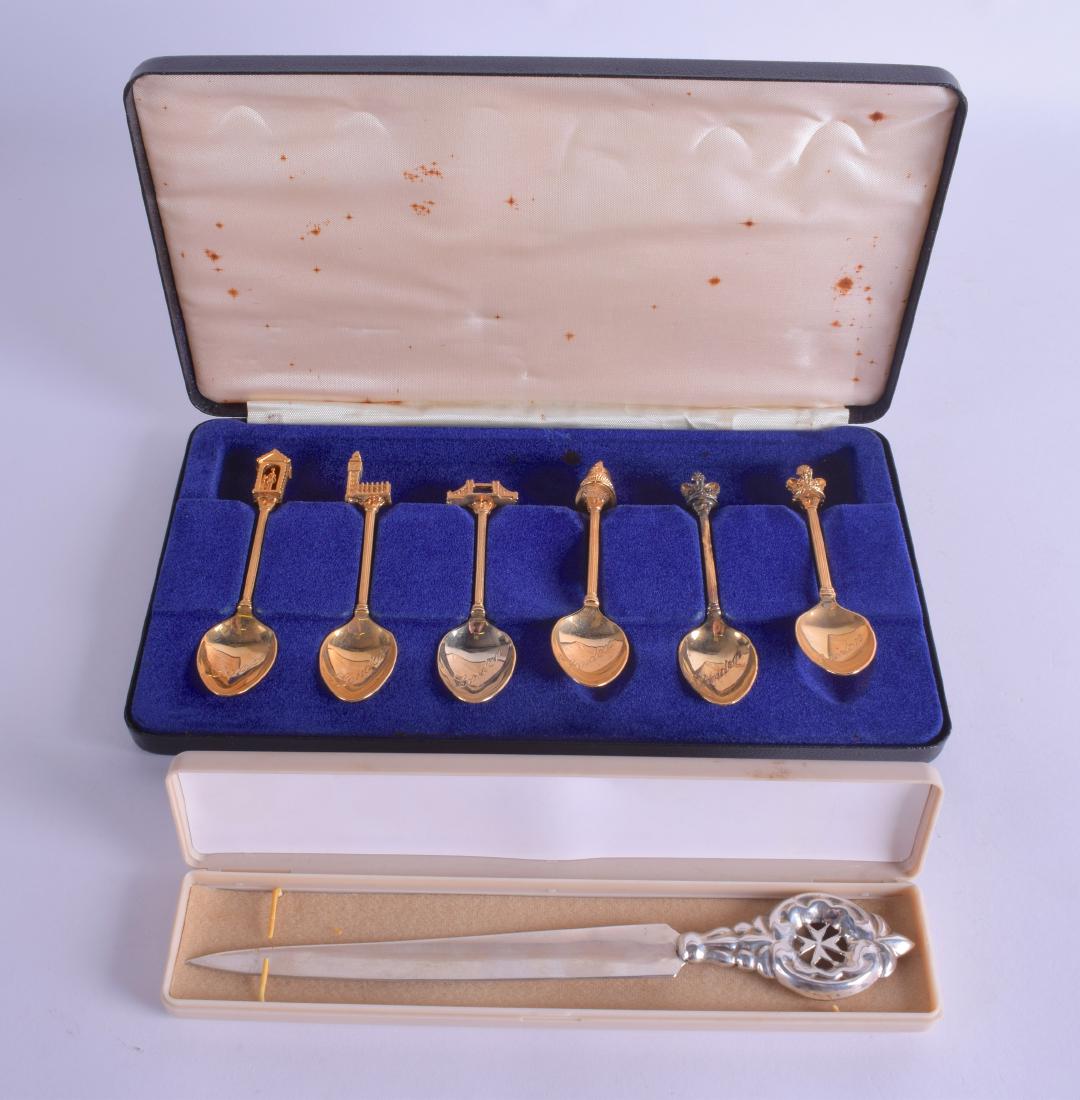 A MODERN SILVER LETTER OPENER with openwork terminal,: A MODERN SILVER LETTER OPENER with openwork terminal, together with a set of coronation Queens Jubilee spoons. 1 oz. 20 cm long. (7)