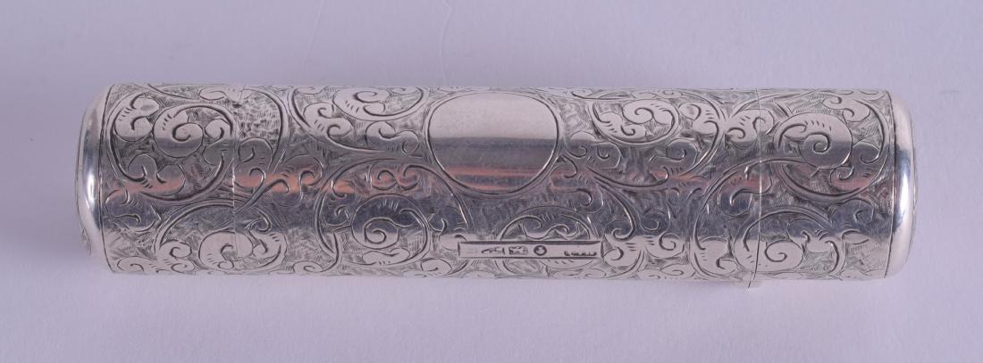 A RARE VICTORIAN DOUBLE ENDED SILVER SCENT BOTTLE: A RARE VICTORIAN DOUBLE ENDED SILVER SCENT BOTTLE engraved with foliage. Chester (date letter rubbed). 9 cm long.