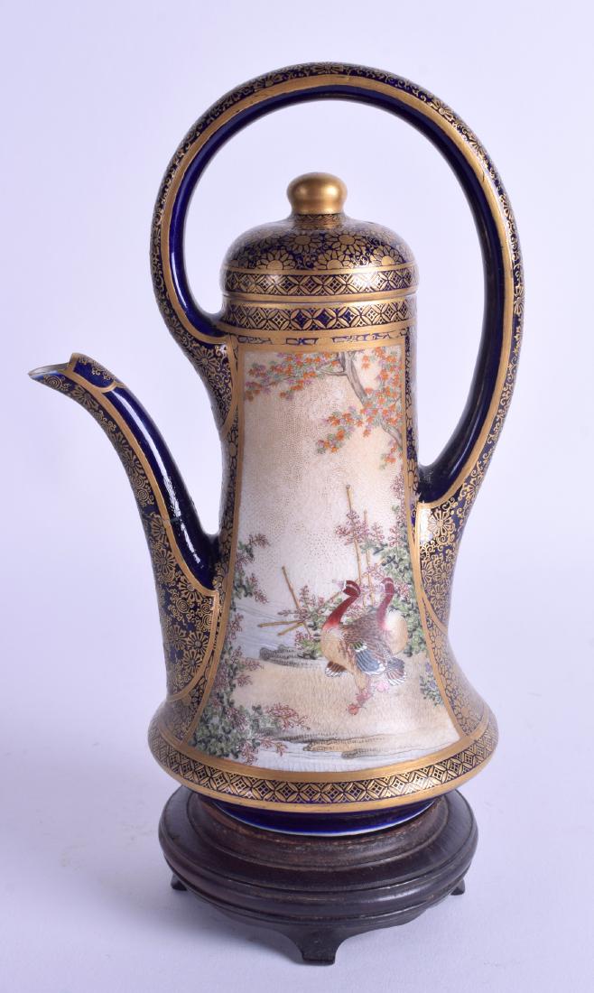 A GOOD 19TH CENTURY JAPANESE MEIJI PERIOD SATSUMA EWER: A GOOD 19TH CENTURY JAPANESE MEIJI PERIOD SATSUMA EWER AND COVER by Kinkozan, painted with birds within landscape. 18 cm high.