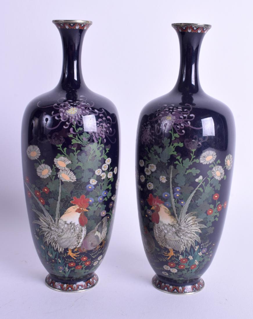 A GOOD PAIR OF 19TH CENTURY JAPANESE MEIJI PERIOD: A GOOD PAIR OF 19TH CENTURY JAPANESE MEIJI PERIOD SILVER CLOISONNE ENAMEL VASES In the manner of Hayashi Kodenji, decorated with fowl within landscapes. 19 cm high.