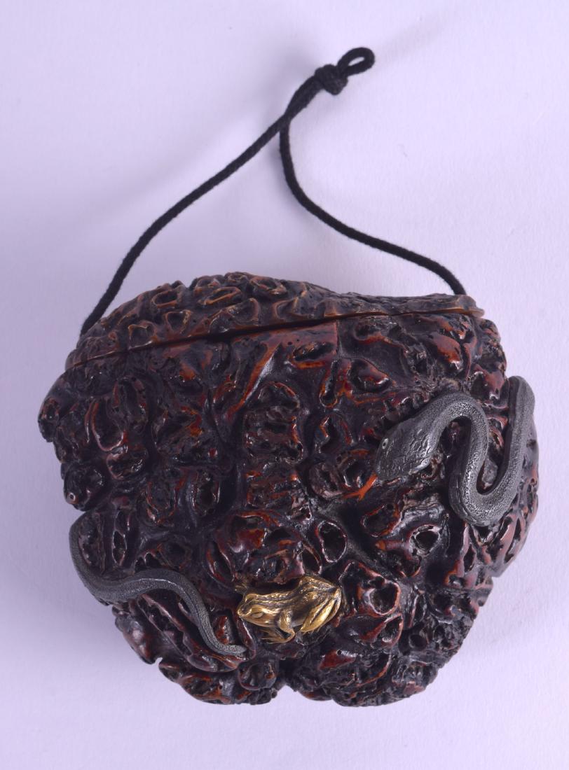 A RARE LARGE 19TH CENTURY JAPANESE MEIJI PERIOD CARVED: A RARE LARGE 19TH CENTURY JAPANESE MEIJI PERIOD CARVED WOOD TOBACCO BOX overlaid with a silvered snake pursuing a golden frog. 12 cm x 12 cm.
