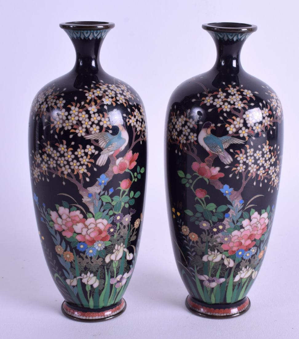 A GOOD PAIR OF EARLY 20TH CENTURY JAPANESE MEIJI PERIOD: A GOOD PAIR OF EARLY 20TH CENTURY JAPANESE MEIJI PERIOD CLOISONNE ENAMEL VASES decorated with birds amongst foliage. 15.5 cm high.