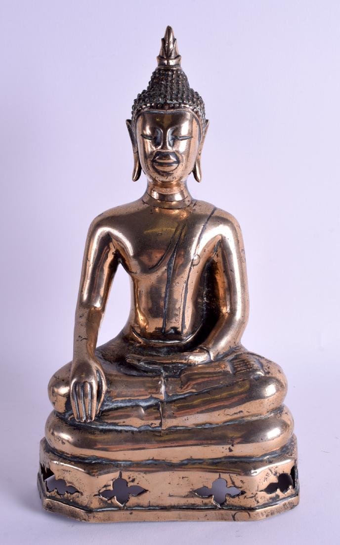 A GOOD 18TH CENTURY SOUTH EAST ASIAN BRONZE BUDDHA: A GOOD 18TH CENTURY SOUTH EAST ASIAN BRONZE BUDDHA modelled seated upon a triangular base. 29 cm x 15 cm.