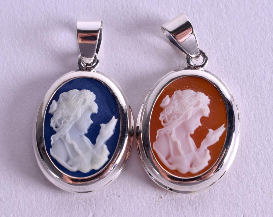 TWO SILVER PENDANTS. (2) (1 of 2)