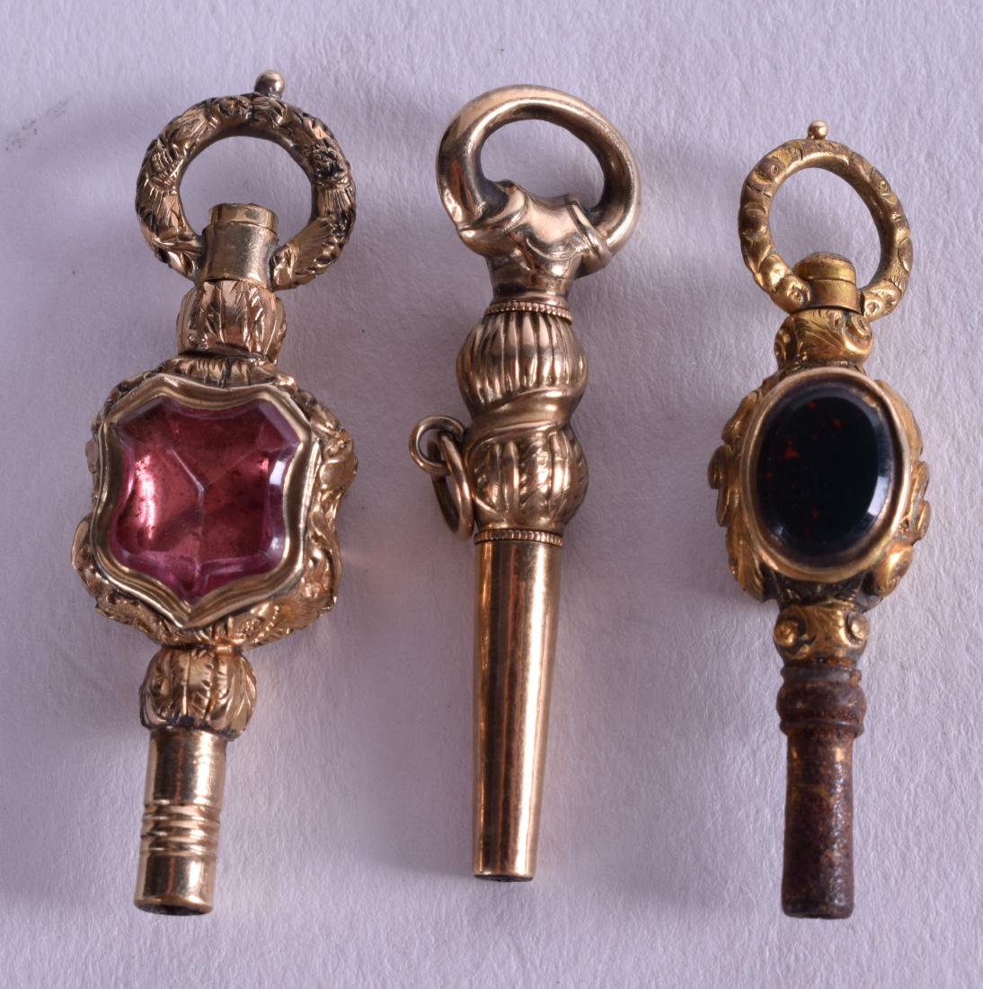 THREE VICTORIAN GEM SET WATCH FOBS. (3) (1 of 2)