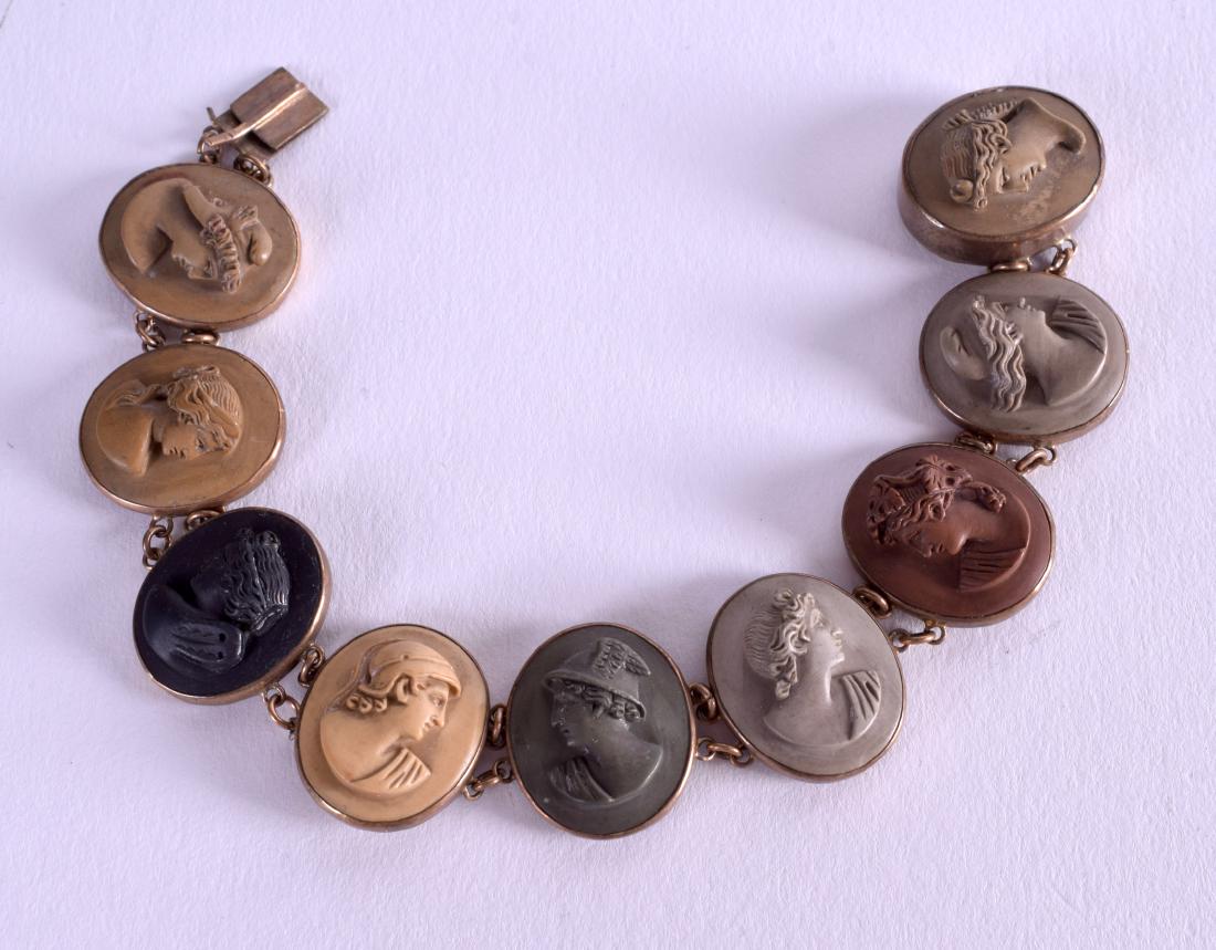 A VICTORIAN LAVA STONE CAMEO BRACELET. 14 cm long. (1 of 2)