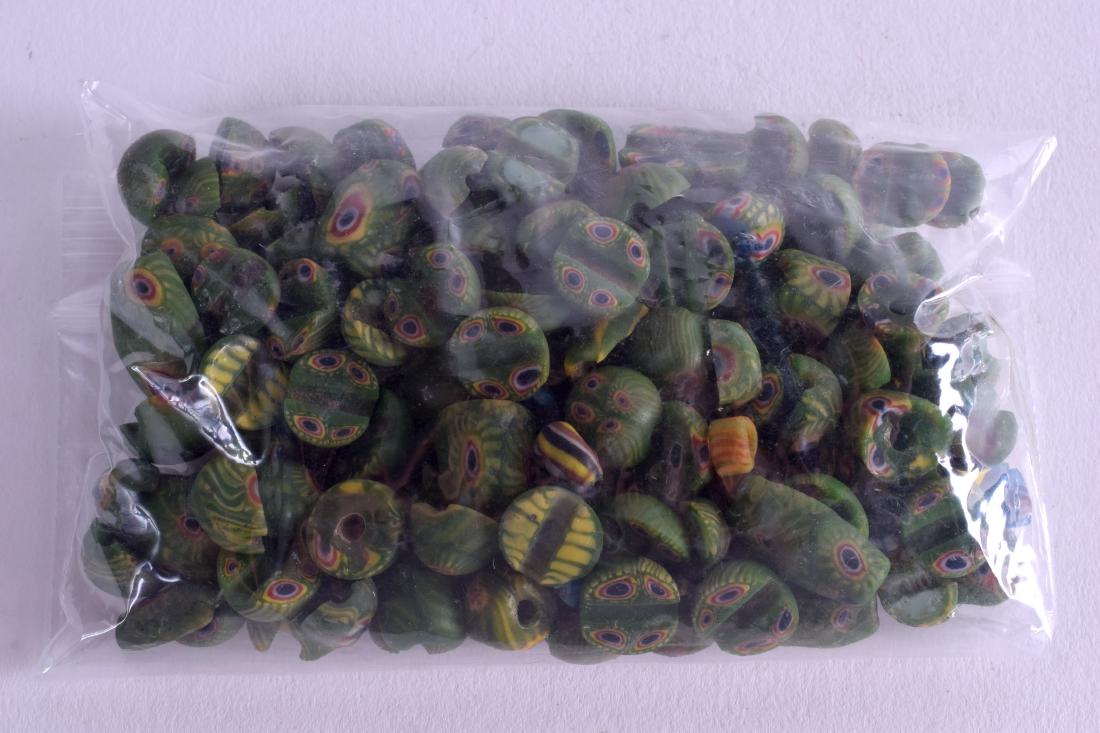 A GROUP OF ASSORTED GLASS BEADS possibly antiquity. (1 of 1)