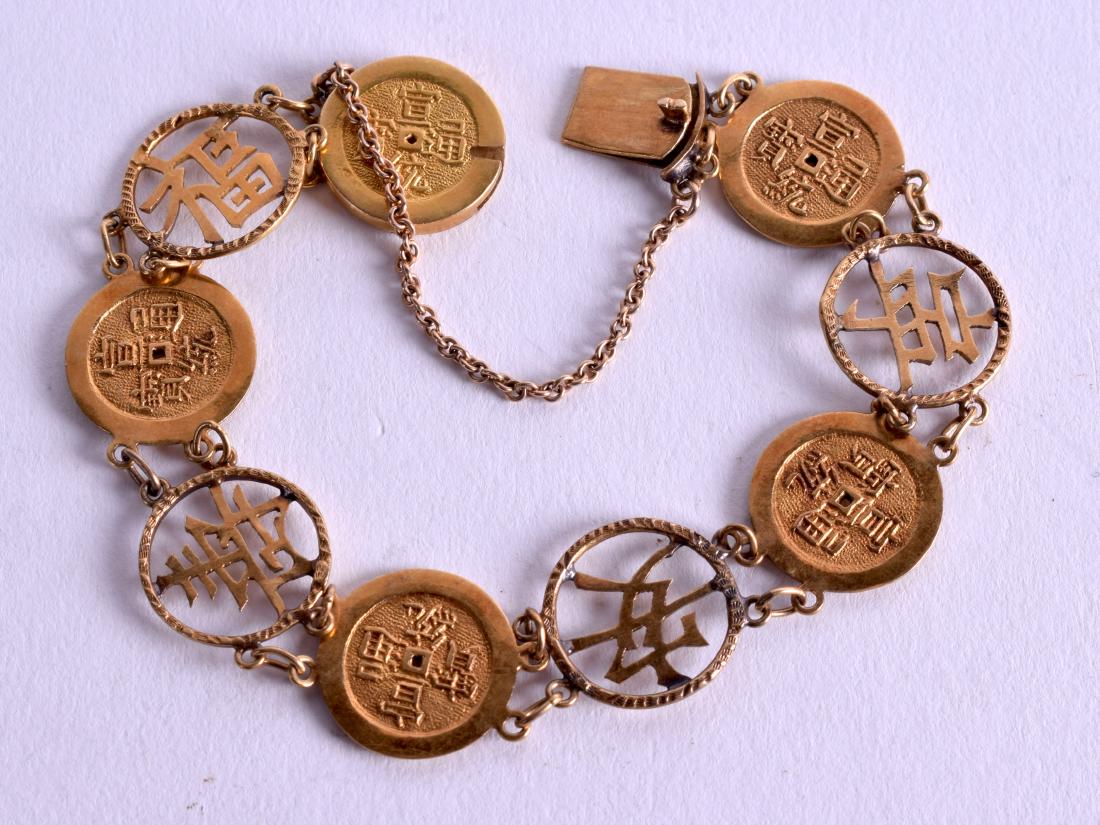 A CHINESE 20CT GOLD WANG HING BRACELET. 15.8 grams. 15: A CHINESE 20CT GOLD WANG HING BRACELET. 15.8 grams. 15 cm long.