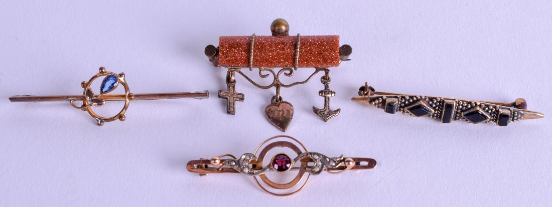 FOUR YELLOW METAL BAR BROOCHES. (4) (1 of 2)