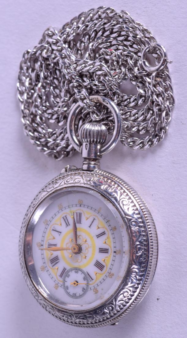 A CONTINENTAL SILVER FOB WATCH. 2.75 cm diameter. (1 of 5)