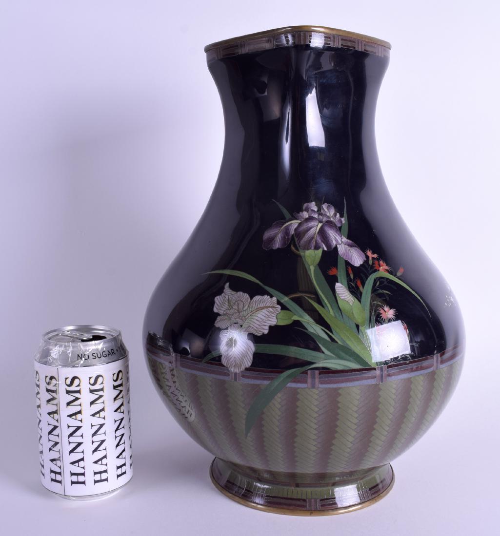 A GOOD LARGE 19TH CENTURY JAPANESE MEIJI PERIOD: A GOOD LARGE 19TH CENTURY JAPANESE MEIJI PERIOD CLOISONNE ENAMEL VASE decorated with baskets of foliage. 32 cm x 18 cm.