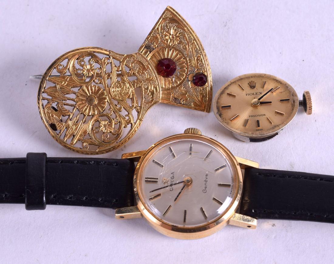 AN OMEGA WATCH together with a movement etc. (3): AN OMEGA WATCH together with a movement etc. (3)
