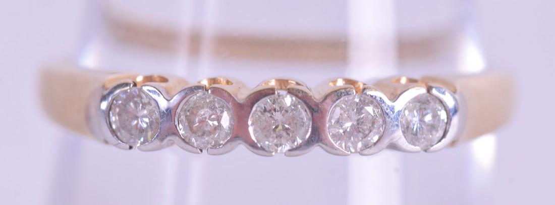 A 9CT GOLD AND DIAMOND RING. 1.9 grams. Size P.: A 9CT GOLD AND DIAMOND RING. 1.9 grams. Size P.