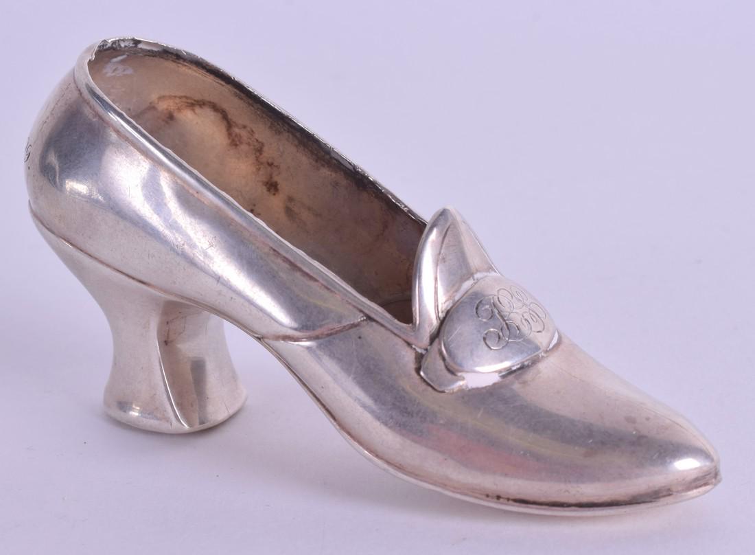 A VINTAGE STERLING SILVER BOOT. 8.5 cm wide.: A VINTAGE STERLING SILVER BOOT. 8.5 cm wide.