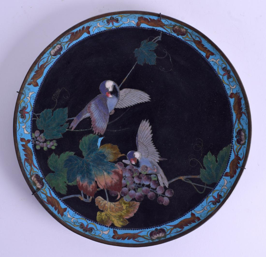 A 19TH CENTURY JAPANESE MEIJI PERIOD CLOISONNE ENAMEL: A 19TH CENTURY JAPANESE MEIJI PERIOD CLOISONNE ENAMEL DISH decorated with birds and grapes. 28 cm diameter.