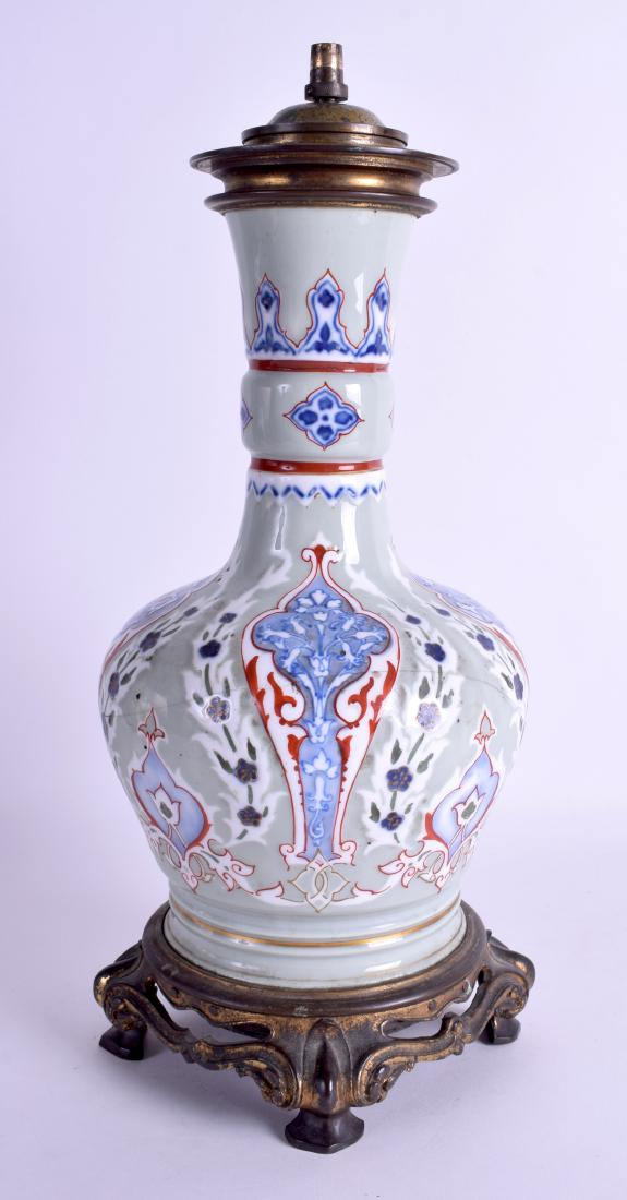 A RARE 19TH CENTURY CHINESE 'ISLAMIC MARKET' CELADON: A RARE 19TH CENTURY CHINESE 'ISLAMIC MARKET' CELADON VASE painted with foliage and vines. Vase 30 cm high.