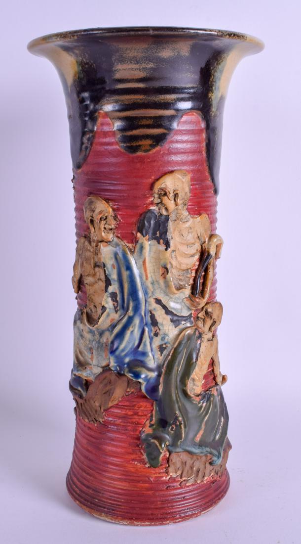 A JAPANESE MEIJI PERIOD SUMIDA GAWA POTTERY VASE: A JAPANESE MEIJI PERIOD SUMIDA GAWA POTTERY VASE decorated with Buddhistic figures. 31 cm high.