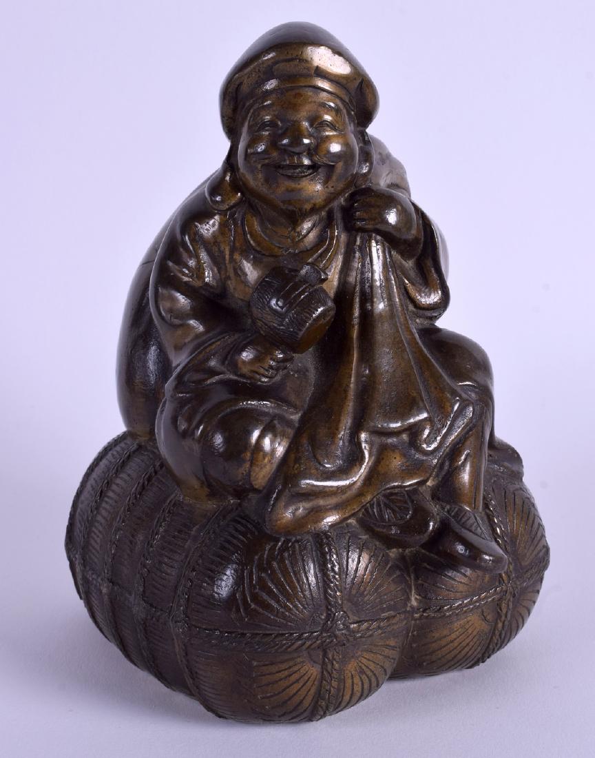 A JAPANESE MEIJI PERIOD BRONZE FIGURE OF DAIKOKU. 17 cm: A JAPANESE MEIJI PERIOD BRONZE FIGURE OF DAIKOKU. 17 cm x 10 cm.